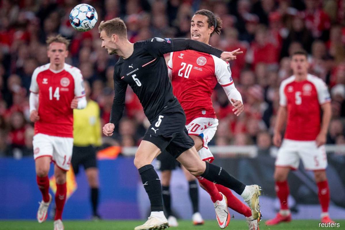Denmark reach World Cup with 1-0 win over Austria